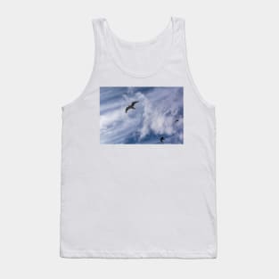 Three seagulls flying in the blue cloudy sky Tank Top